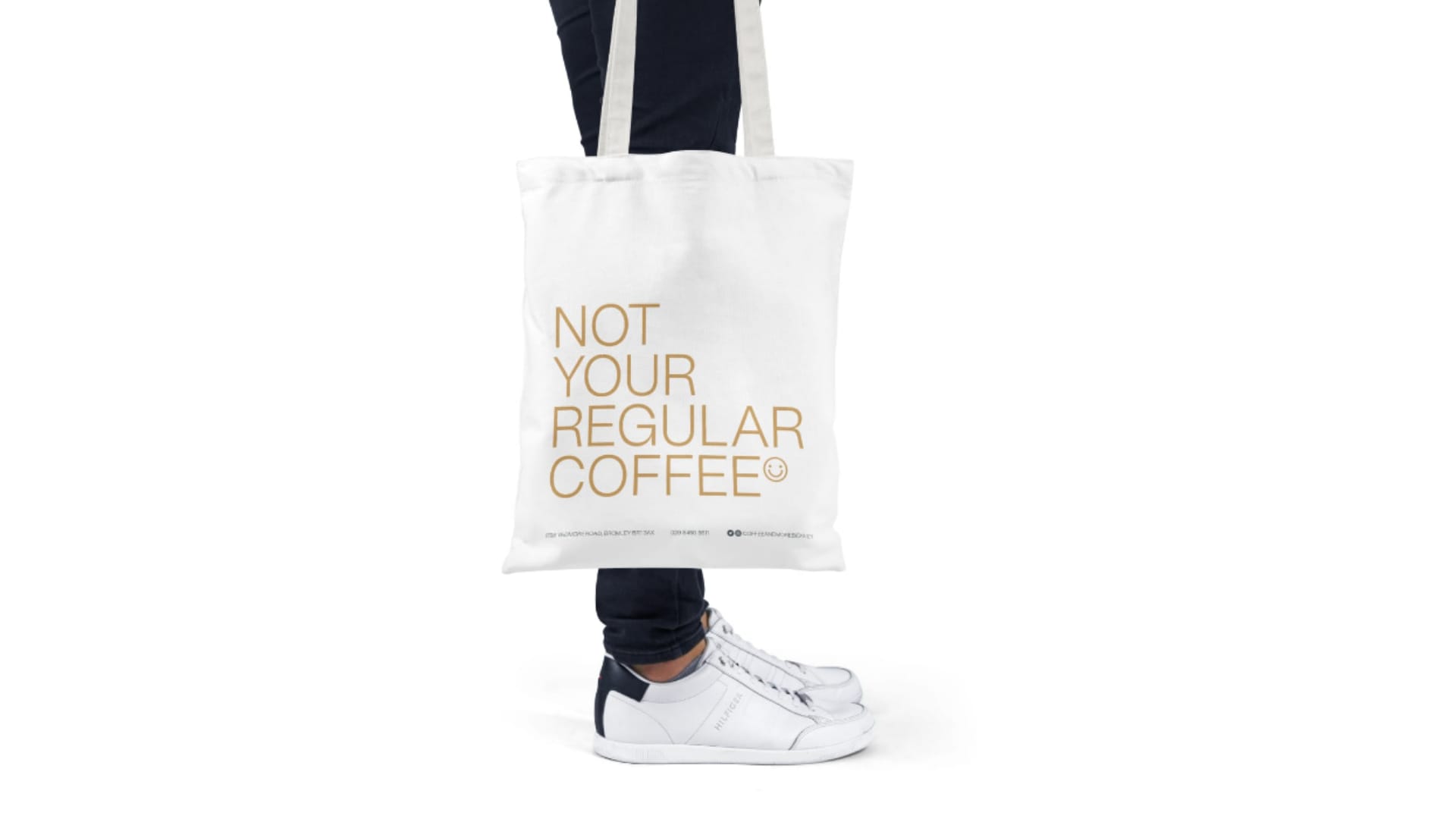 A wall hanging with coffee illustrations and he slogan 'Not your regular coffee'.